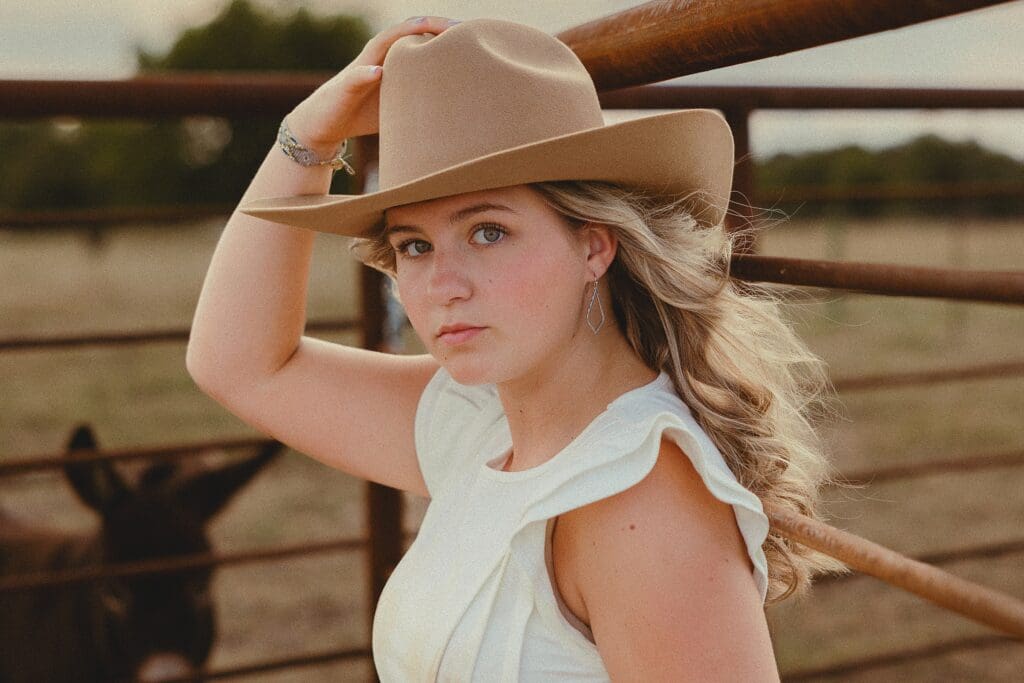 Austin senior photographer capturing senior rep team at a cattle ranch