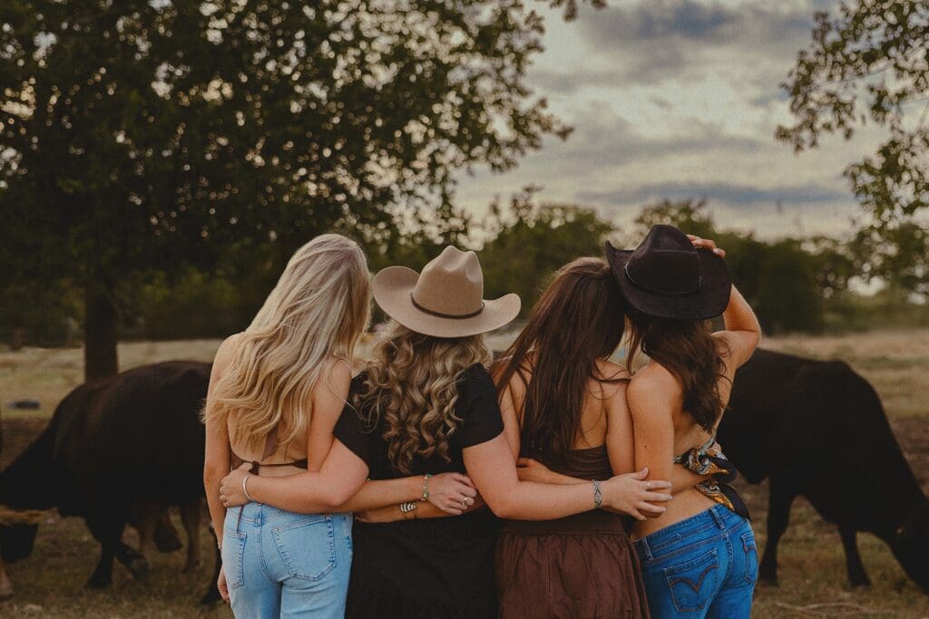 Austin senior photographer capturing senior rep team at a cattle ranch