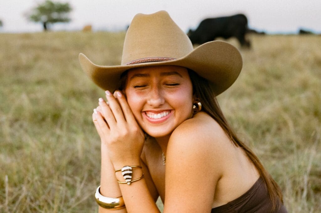 Austin senior photographer capturing senior rep team at a cattle ranch